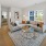 a living room with a couch and a coffee table