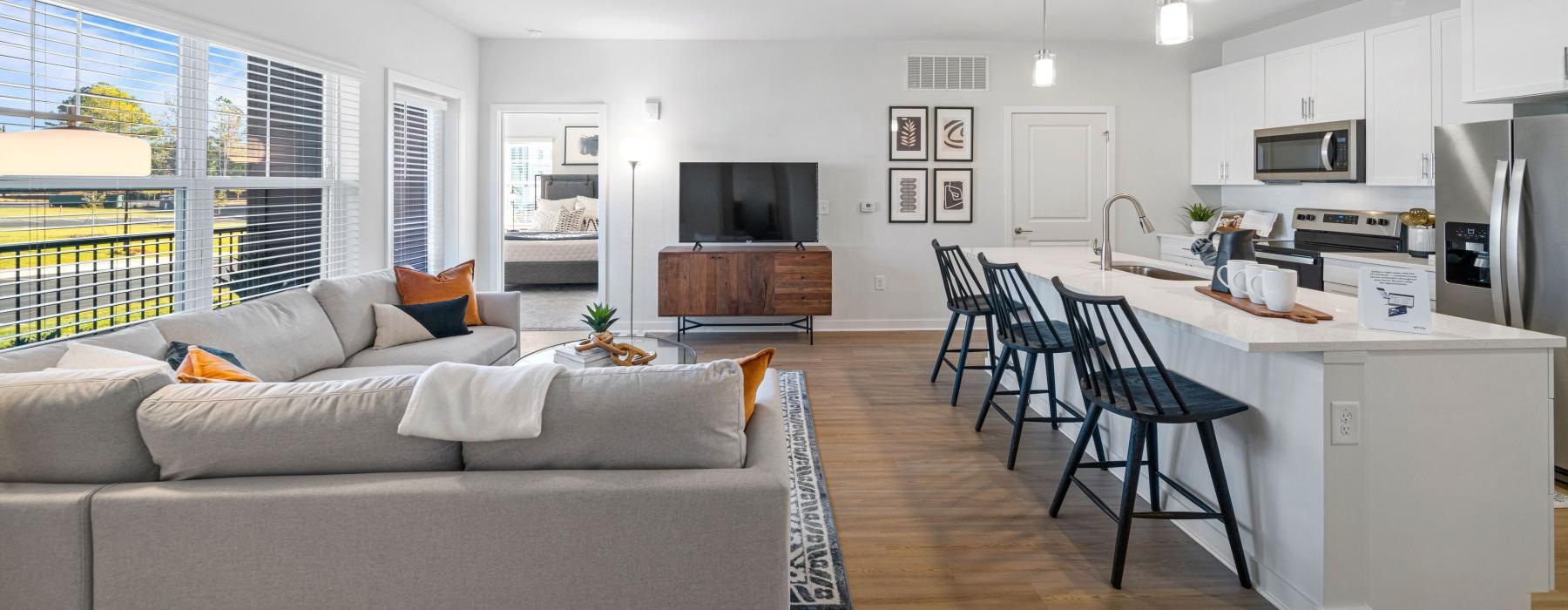 a living room with a couch and a table