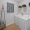 a laundry room with a washer and dryer